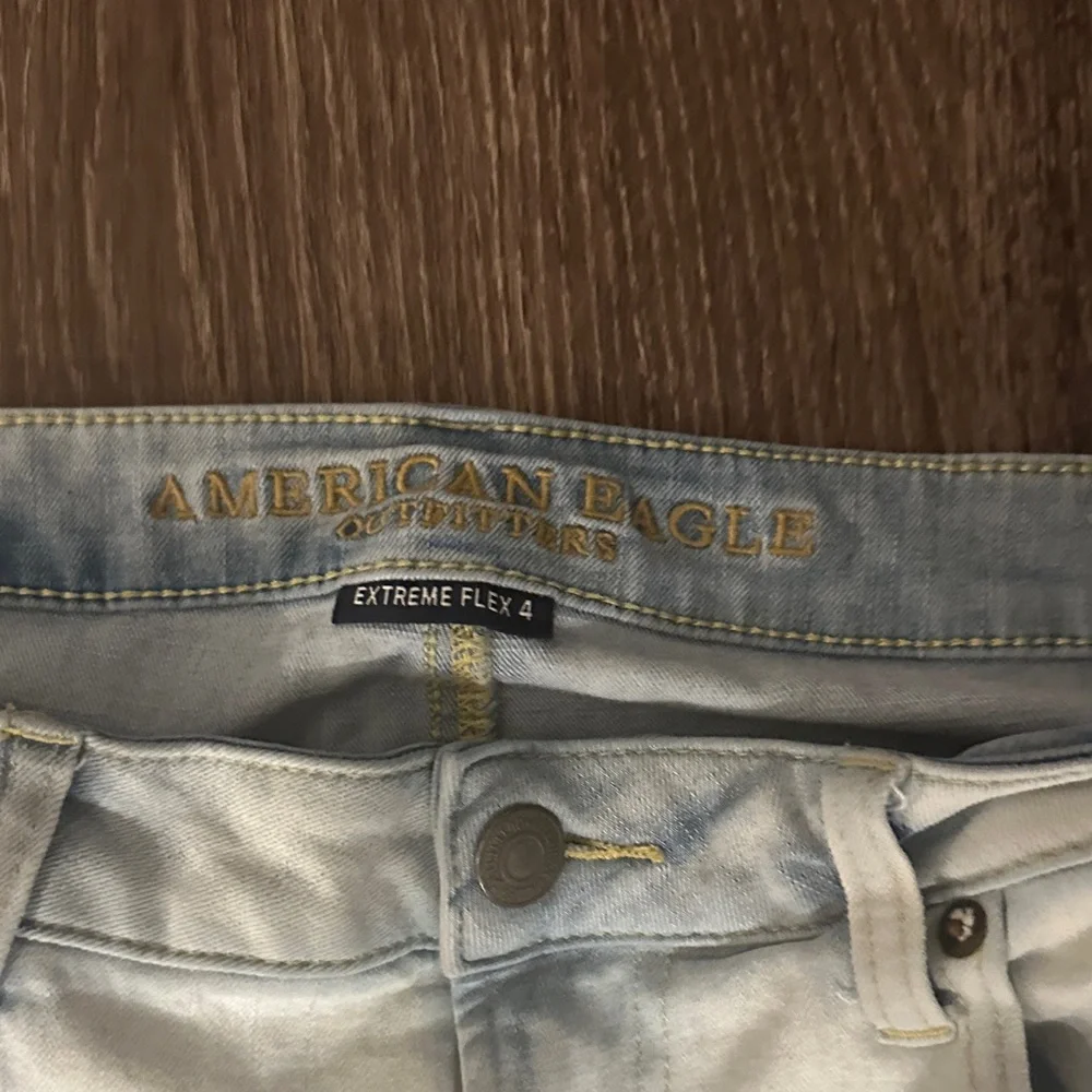 American Eagle Outfitters Light Blue Distressed Jean Shorts - Picture 3 of 4